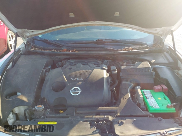 2013 Nissan Maxima S with VIN 1N4AA5AP0DC828618, listed as a IAAI auction lot 42679983 with 156,445 mi miles and . Bid and sale history available at DreamBid. Image 10.