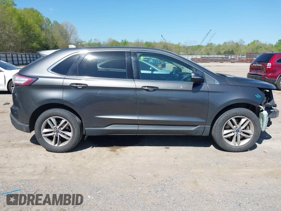 2016 Ford Edge SEL z VIN 2FMPK4J96GBB18054, wystawiony jako IAAI lot #42031225 z przebiegiem 167 461 mil mil oraz . Historia ofert i sprzedaży dostępna na DreamBid. Obrazek 13.