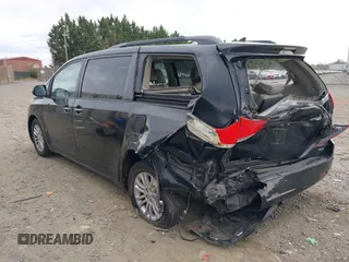 2011 Toyota Sienna XLE AAS with VIN 5TDYK3DC4BS053495, listed as a IAAI auction lot 41963995 with 215,300 mi miles and . Bid and sale history available at DreamBid. Image 3.