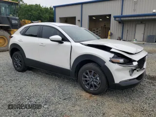 2025 Mazda CX-30 S with VIN 3MVDMBAM2SM764529, listed as a Copart auction lot 54394175 with 7,095 mi miles and Salvage title. Bid and sale history available at DreamBid. Image 4.