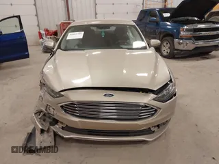 2018 Ford Fusion SE z VIN 3FA6P0HD2JR201693, wystawiony jako IAAI lot #42012709 z przebiegiem 110 857 mil mil oraz . Historia ofert i sprzedaży dostępna na DreamBid. Obrazek 12.