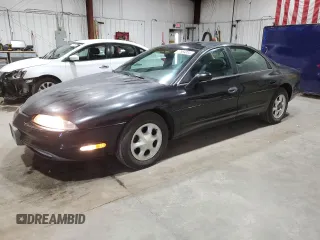1999 Oldsmobile Aurora with VIN 1G3GR62C8X4117519, listed as a Copart auction lot 77984084 with 188,949 mi miles and Clean Title. Bid and sale history available at DreamBid. Image 1.