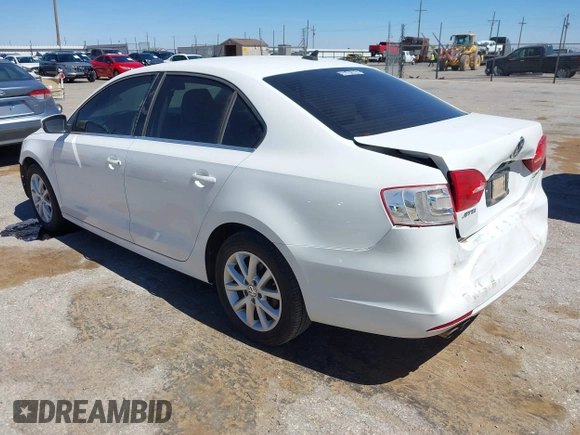 2013 Volkswagen Jetta SE z VIN 3VWDX7AJ4DM424276, wystawiony jako IAAI lot #41878223 z przebiegiem 152 789 mil mil oraz . Historia ofert i sprzedaży dostępna na DreamBid. Obrazek 3.