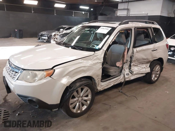 2012 Subaru Forester X Premium with VIN JF2SHADC8CH429115, listed as a IAAI auction lot 41863506 with 114,368 mi miles and . Bid and sale history available at DreamBid. Image 19.