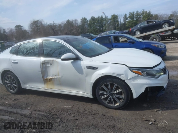 2019 Kia Optima LX with VIN 5XXGT4L38KG300213, listed as a IAAI auction lot 41775052 with 141,402 mi miles. Bid and sale history available at carsss.com. Image 13.