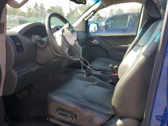 2015 Nissan Frontier Pro-4X with VIN 1N6AD0EV2FN736394, listed as a Copart auction lot 53916455 with 116,801 mi miles and Salvage title. Bid and sale history available at DreamBid. Image 7.