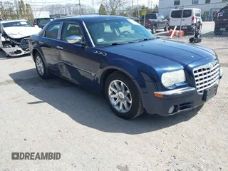 2005 Chrysler 300 C with VIN 2C3JA63HX5H124452, listed as a IAAI auction lot 41877404 with 93,972 mi miles and . Bid and sale history available at DreamBid. Image 1.