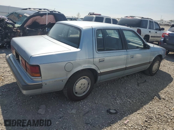 1989 Dodge Spirit z VIN 1B3BA46K1KF408949, wystawiony jako Copart lot #80767594 z przebiegiem 137 766 mil mil oraz Nie do naprawy. Historia ofert i sprzedaży dostępna na DreamBid. Obrazek 3.