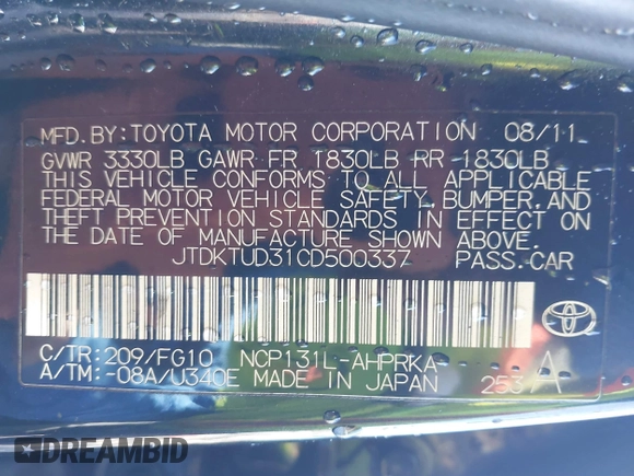 2012 Toyota Yaris L with VIN JTDKTUD31CD500337, listed as a IAAI auction lot 41410723 with 130,881 mi miles. Bid and sale history available at carsss.com. Image 9.