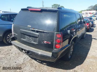 2008 GMC Yukon XL Denali with VIN 1GKFK66888J141543, listed as a IAAI auction lot 41998054 with 253,957 mi miles. Bid and sale history available at carsss.com. Image 4.