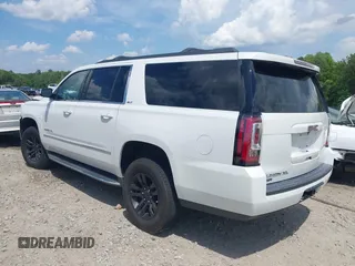 2017 GMC Yukon XL SLT z VIN 1GKS2GKC5HR160468, wystawiony jako IAAI lot #42166908 z przebiegiem 131 469 mil mil oraz . Historia ofert i sprzedaży dostępna na DreamBid. Obrazek 3.