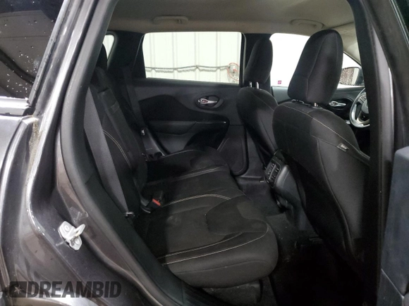 2015 Jeep Cherokee Latitude z VIN 1C4PJMCS9FW750275, wystawiony jako Copart lot #64191695 z przebiegiem 130 818 mil mil oraz Szkoda całkowita • Salvage title. Historia ofert i sprzedaży dostępna na DreamBid. Obrazek 11.