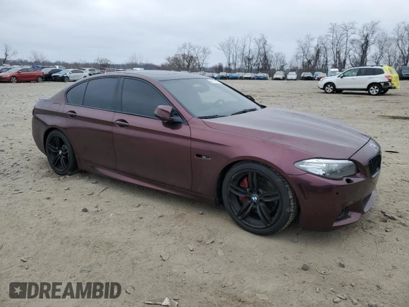 2014 BMW 5 Series 550i xDrive with VIN WBAKP9C5XEDZ35149, listed as a Copart auction lot 48979585 with Not provided miles and Salvage title. Bid and sale history available at DreamBid. Image 4.