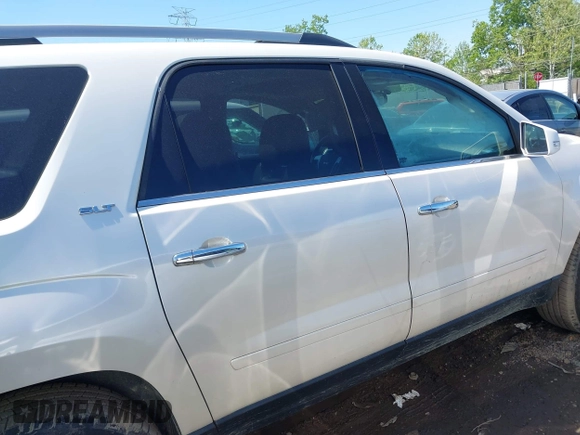 2014 GMC Acadia SLT z VIN 1GKKRRKD3EJ219690, wystawiony jako IAAI lot #42221261 z przebiegiem 103 675 mil mil oraz . Historia ofert i sprzedaży dostępna na DreamBid. Obrazek 14.