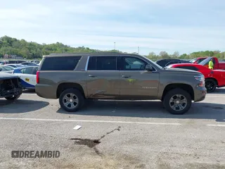 2016 Chevrolet Suburban LT z VIN 1GNSKHKC2GR289761, wystawiony jako IAAI lot #42086912 z przebiegiem 247 791 mil mil oraz . Historia ofert i sprzedaży dostępna na DreamBid. Obrazek 13.