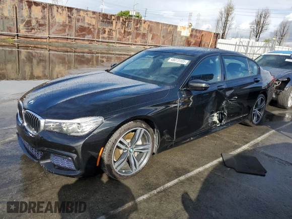 2017 BMW 7 Series 740i with VIN WBA7E2C59HG739788, listed as a Copart auction lot 48073105 with 36,274 mi miles and Salvage Title. Bid and sale history available at carsss.com. Image 1.