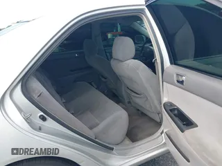 2005 Toyota Camry LE with VIN 4T1BE30K35U572110, listed as a IAAI auction lot 42674324 with 147,480 mi miles and . Bid and sale history available at DreamBid. Image 8.