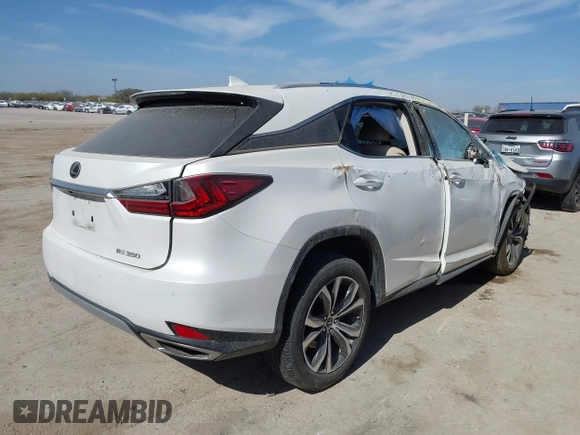 2021 Lexus RX with VIN JTJHZMDA6M2050525, listed as a IAAI auction lot 41788945 with 37,711 mi miles. Bid and sale history available at carsss.com. Image 4.