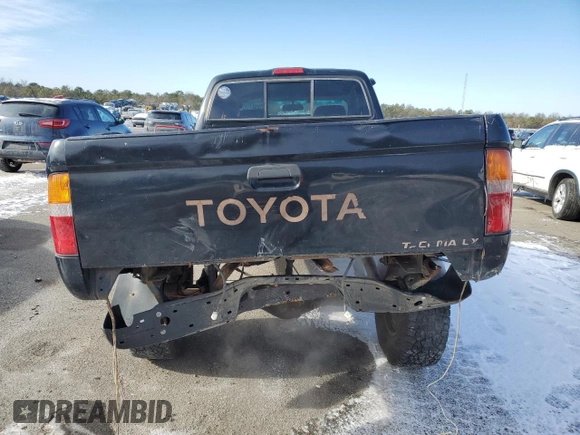 1996 Toyota Tacoma z VIN 4TAWM72N8TZ183580, wystawiony jako Copart lot #42058255 z przebiegiem 271 645 mil mil oraz Szkoda całkowita • Salvage title. Historia ofert i sprzedaży dostępna na DreamBid. Obrazek 6.