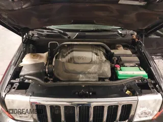 2010 Jeep Commander Sport z VIN 1J4RG4GT4AC115611, wystawiony jako IAAI lot #42286985 z przebiegiem 149 365 mil mil oraz . Historia ofert i sprzedaży dostępna na DreamBid. Obrazek 10.