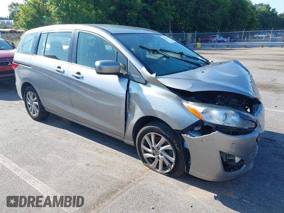 2012 Mazda 5 Sport with VIN JM1CW2BLXC0129303, listed as a IAAI auction lot 42556899 with 200,863 mi miles and . Bid and sale history available at DreamBid. Image 1.