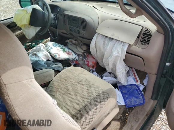 1999 Ford F-150 с VIN 1FTZX1723XNB11655, выставлен на аукционе Copart как лот 57573695 с пробегом Не указан миль и Списание • Salvage title. История ставок и продаж доступна на DreamBid. Изображение 8.