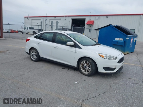 2015 Ford Focus SE with VIN 1FADP3F23FL255584, listed as a IAAI auction lot 41990636 with 151,389 mi miles. Bid and sale history available at carsss.com. Image 1.