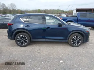 2022 Mazda CX-5 2.5 S Premium Plus Package with VIN JM3KFBEM1N0527915, listed as a IAAI auction lot 41942476 with 40,145 mi miles. Bid and sale history available at carsss.com. Image 13.