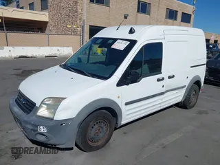 2012 Ford Transit Connect XL z VIN NM0LS7AN4CT083751, wystawiony jako IAAI lot #42100238 z przebiegiem 115 280 mil mil oraz . Historia ofert i sprzedaży dostępna na DreamBid. Obrazek 2.