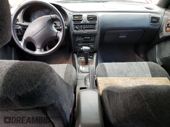 1998 Subaru Legacy GT with VIN 4S3BK6750W7320376, listed as a Copart auction lot 58223125 with 127,481 mi miles and Salvage title. Bid and sale history available at DreamBid. Image 8.