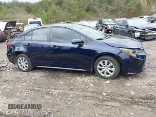2023 Toyota Corolla LE with VIN 5YFB4MDEXPP032982, listed as a IAAI auction lot 41728893 with 21,887 mi miles and . Bid and sale history available at DreamBid. Image 12.