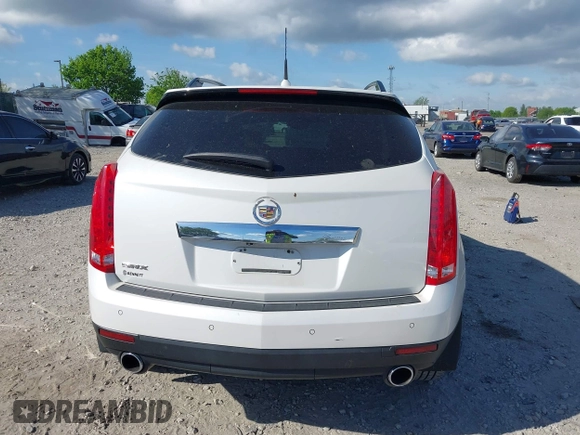 2011 Cadillac SRX Performance Collection z VIN 3GYFNBEYXBS543819, wystawiony jako IAAI lot #42159051 z przebiegiem Nie podano mil oraz . Historia ofert i sprzedaży dostępna na DreamBid. Obrazek 17.