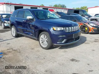 2017 Jeep Grand Cherokee Summit z VIN 1C4RJFJGXHC755217, wystawiony jako IAAI lot #42362400 z przebiegiem 75 090 mil mil oraz . Historia ofert i sprzedaży dostępna na DreamBid. Obrazek 1.