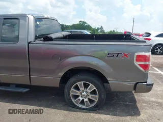 2014 Ford F-150 XL with VIN 1FTEX1CM4EKF42963, listed as a IAAI auction lot 42593646 with 143,409 mi miles and . Bid and sale history available at DreamBid. Image 3.