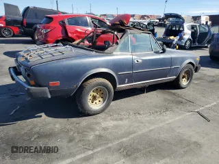 1979 FIAT 124 Spider z VIN 124C520160260, wystawiony jako Copart lot #77263224 z przebiegiem 68 917 mil mil oraz Czysty tytuł • Clean title. Historia ofert i sprzedaży dostępna na DreamBid. Obrazek 3.