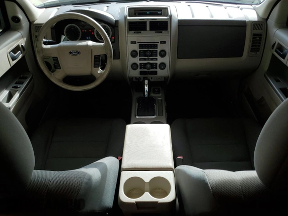 2009 Ford Escape Hybrid z VIN 1FMCU49389KB29641, wystawiony jako Copart lot #51164235 z przebiegiem 131 596 mil mil oraz Szkoda całkowita • Salvage title. Historia ofert i sprzedaży dostępna na DreamBid. Obrazek 8.