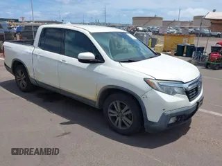2018 Honda Ridgeline Sport with VIN 5FPYK2F12JB001198, listed as a IAAI auction lot 42000049 with 151,013 mi miles and . Bid and sale history available at DreamBid. Image 1.