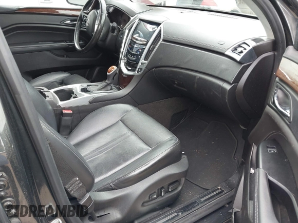 2016 Cadillac SRX Luxury Collection with VIN 3GYFNBE31GS505097, listed as a IAAI auction lot 41872175 with 92,806 mi miles. Bid and sale history available at carsss.com. Image 5.