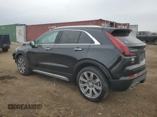 2022 Cadillac XT4 AWD Premium Luxury z VIN 1GYFZDR43NF132553, wystawiony jako Copart lot #50869955 z przebiegiem 25 412 mil mil oraz Szkody całkowita. Historia ofert i sprzedaży dostępna na DreamBid. Obrazek 2.