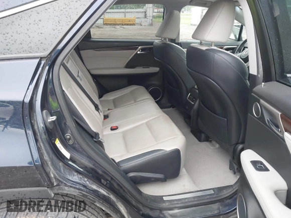 2016 Lexus RX 350 with VIN 2T2BZMCA1GC012079, listed as a IAAI auction lot 42265304 with 124,861 mi miles and . Bid and sale history available at DreamBid. Image 8.
