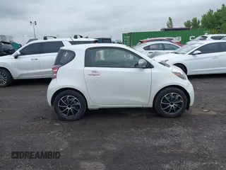 2012 Scion iQ with VIN JTNJJXB08CJ019333, listed as a IAAI auction lot 42348785 with 138,501 mi miles and . Bid and sale history available at DreamBid. Image 13.