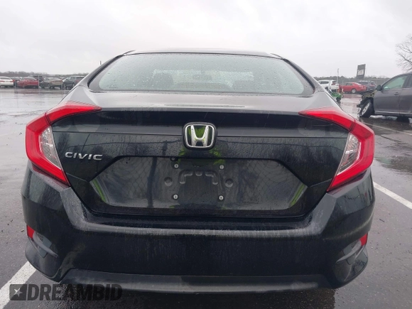 2018 Honda Civic LX with VIN 2HGFC2F54JH548274, listed as a IAAI auction lot 41864457 with 60,905 mi miles and . Bid and sale history available at DreamBid. Image 16.