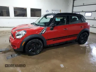 2013 MINI Countryman S with VIN WMWZC3C53DWP24952, listed as a Copart auction lot 62611435 with 123,272 mi miles and Clean title. Bid and sale history available at DreamBid. Image 1.