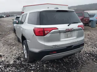 2019 GMC Acadia SLE with VIN 1GKKNKLA9KZ105777, listed as a IAAI auction lot 41711704 with 133,985 mi miles. Bid and sale history available at carsss.com. Image 3.