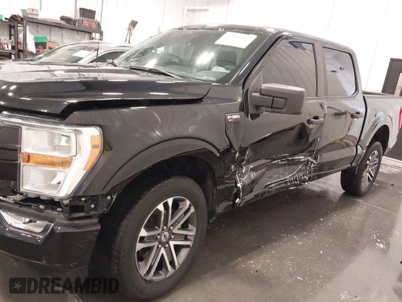 2021 Ford F-150 XL with VIN 1FTFW1E51MFD11166, listed as a IAAI auction lot 41883197 with 33,303 mi miles. Bid and sale history available at carsss.com. Image 6.