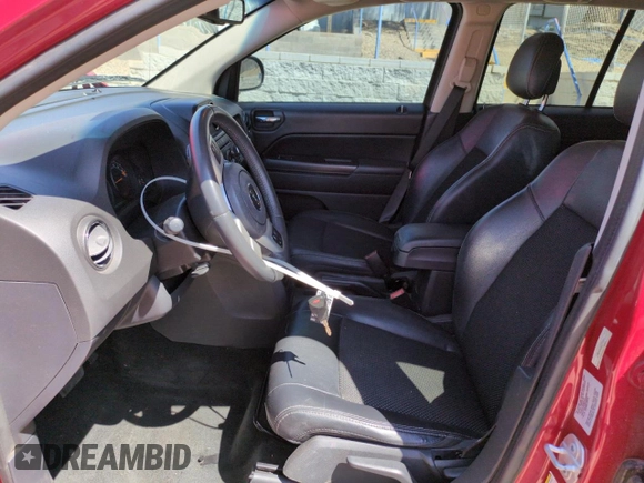 2016 Jeep Compass Sport z VIN 1C4NJCBA9GD777211, wystawiony jako Copart lot #47849215 z przebiegiem 118 804 mil mil oraz Szkoda całkowita • Salvage title. Historia ofert i sprzedaży dostępna na DreamBid. Obrazek 7.