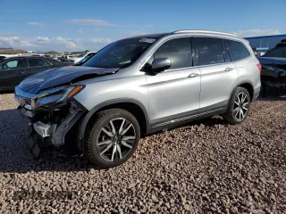 2021 Honda Pilot Touring 8-Passenger with VIN 5FNYF5H97MB001543, listed as a Copart auction lot 42677115 with 40,545 mi miles and Salvage Title. Bid and sale history available at DreamBid. Image 1.
