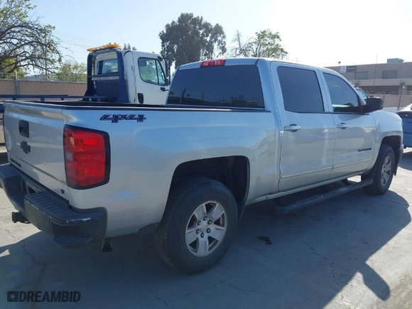 2015 Chevrolet Silverado 1500 LT with VIN 3GCUKREC5FG102367, listed as a IAAI auction lot 41960276 with 167,336 mi miles. Bid and sale history available at carsss.com. Image 4.
