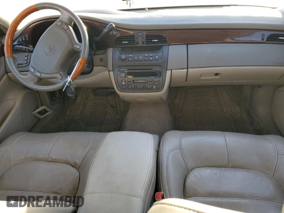 2001 Cadillac DeVille DHS z VIN 1G6KE57Y31U229255, wystawiony jako Copart lot #75101214 z przebiegiem 141 187 mil mil oraz Czysty tytuł • Clean title. Historia ofert i sprzedaży dostępna na DreamBid. Obrazek 8.