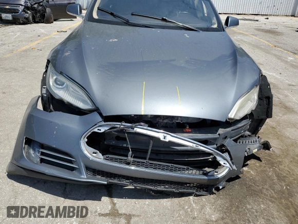 2014 Tesla Model S 60 z VIN 5YJSA1H13EFP36058, wystawiony jako Copart lot #57041725 z przebiegiem Nie podano mil oraz Szkoda całkowita • Salvage title. Historia ofert i sprzedaży dostępna na DreamBid. Obrazek 11.